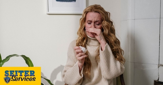 An adult woman struggling with seasonal allergies.