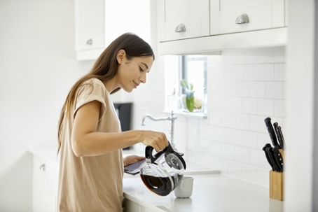 Woman pouring coffee